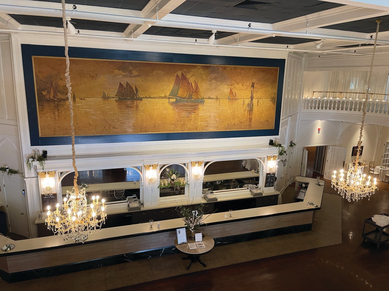 FAMILIAR SIGHT: “The Mural of Narragansett Bay” by Hezekiah A. Dyer, which adorns the wall above the bar outside the Rhodes on the Pawtuxet Ballroom, has been restored as part of the broader revitalization effort.